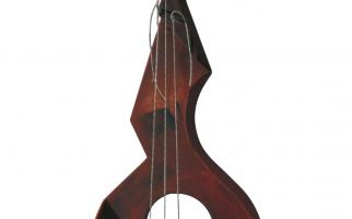 1998. Guitarra Lorquiana II. Tècnica mixta sobre fusta, 49 x 20,5 x 6,5 cm.